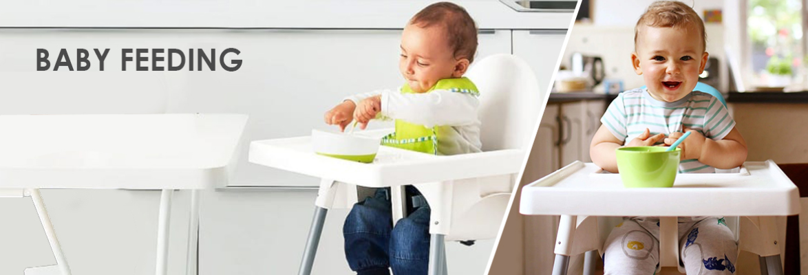 Babies sitting on feeding chair