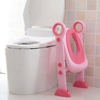Babyhood Pink Step Potty beside the toilet