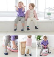 Babies wearingAttipas Bean Grey shoes and playing