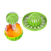 grinding orange using Berz UK Green Grinder Gift Kit