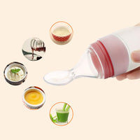 using Little Green Pink Silicone Baby Feeding Spoon Bottle